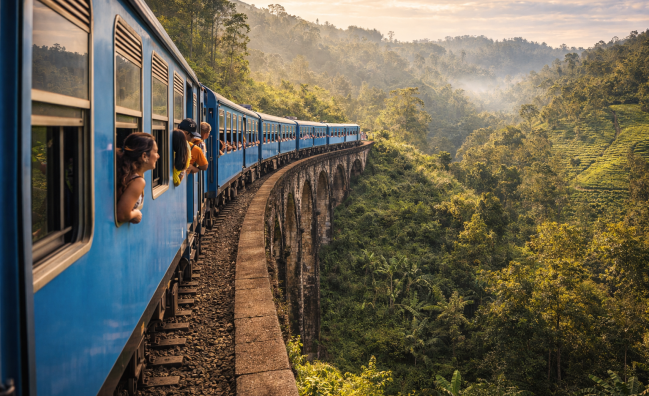 Scenic train ride through tea plantations in Sri Lanka hill country