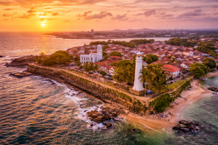 Aerial view of Galle Fort lighthouse and coastline in Galle Sri Lanka