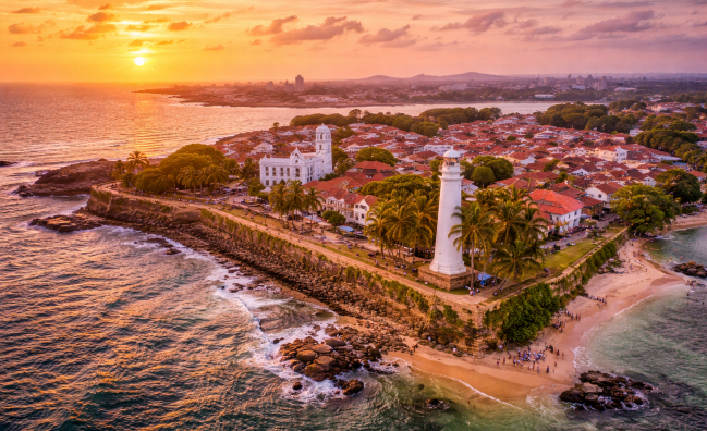 Aerial view of Galle Fort lighthouse and coastline in Galle Sri Lanka